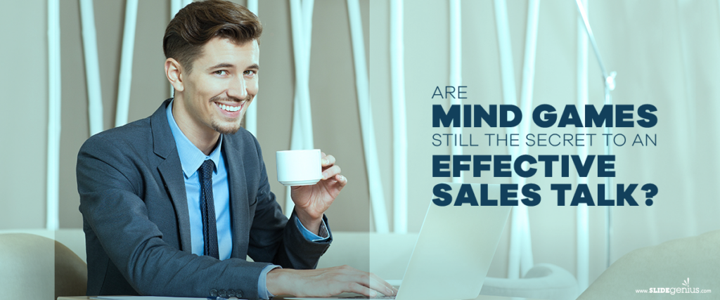 A man in a suit, smiling and holding a white cup, sits at a table with a laptop. Text reads, "Are mind games still the secret to an effective sales talk?" The background features white vertical decor elements, resembling a professional slide template.