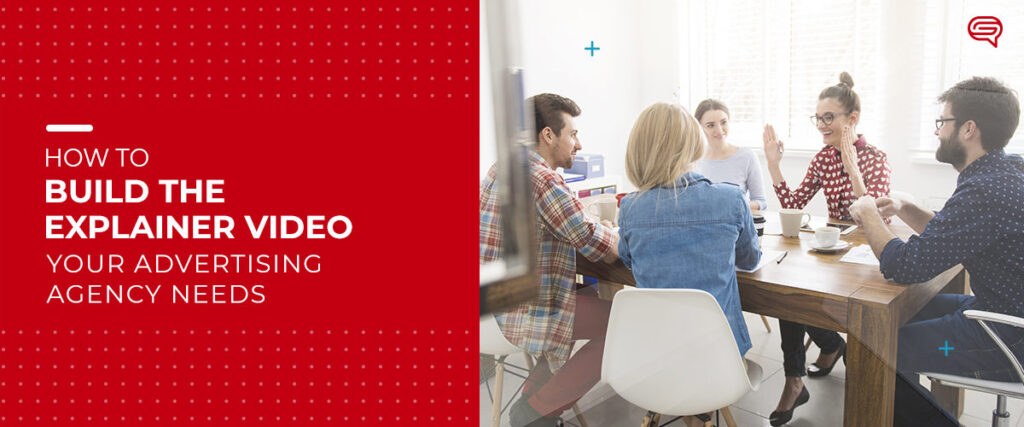A team of five people sits around a table in a modern office, engaged in a discussion. A red banner on the left displays text that reads, "How to Build the Explainer Video Your Advertising Agency Needs," while a PowerPoint presentation enhances their meeting.
