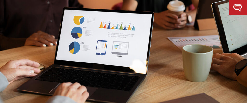 Pitch Deck Presentation Meeting with Laptops and Charts